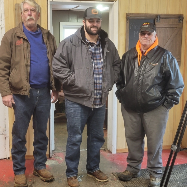 Men posing for a picture
